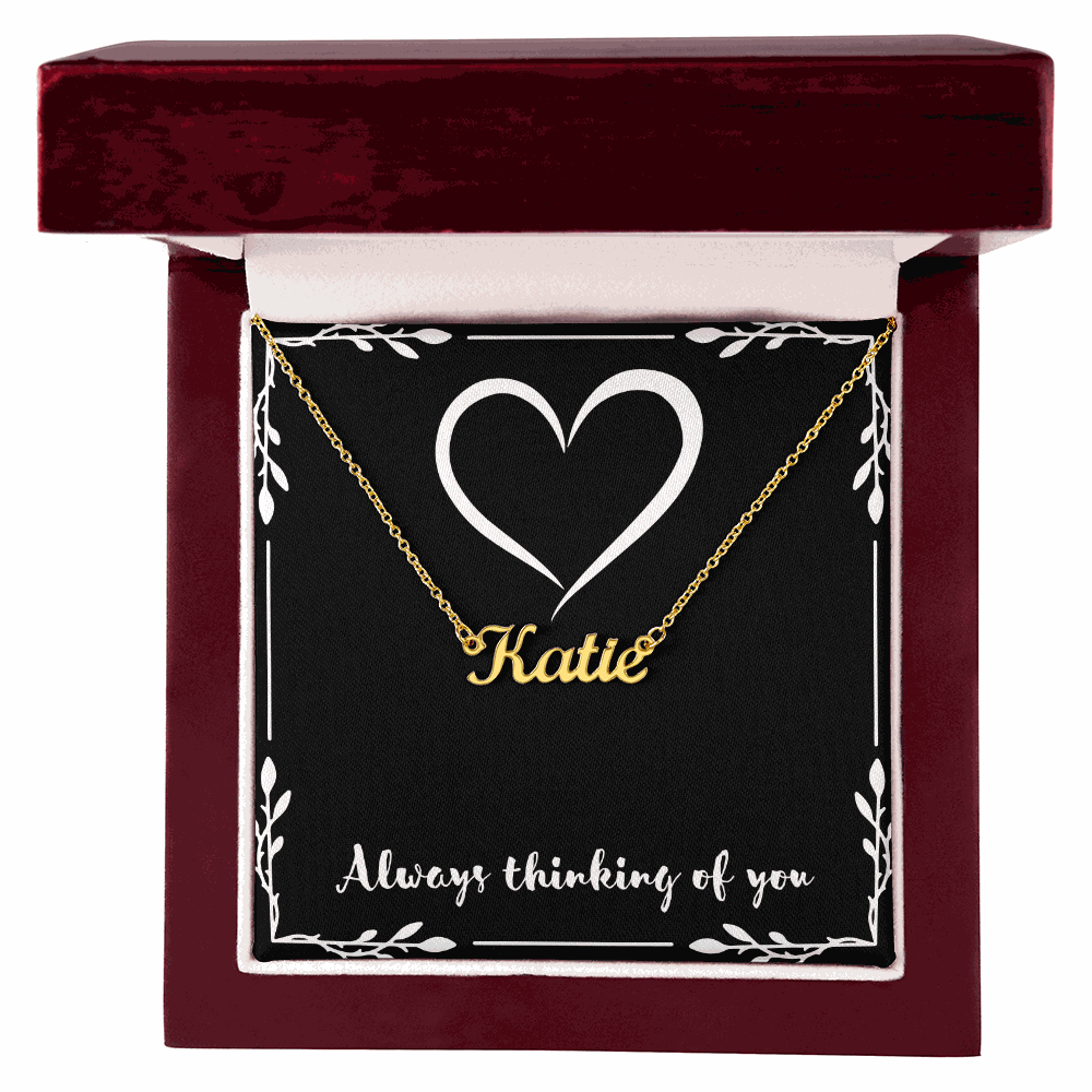 Custom Name Necklace in gold spelling Katie in a red velvet gift box with heart design and Always thinking of you text