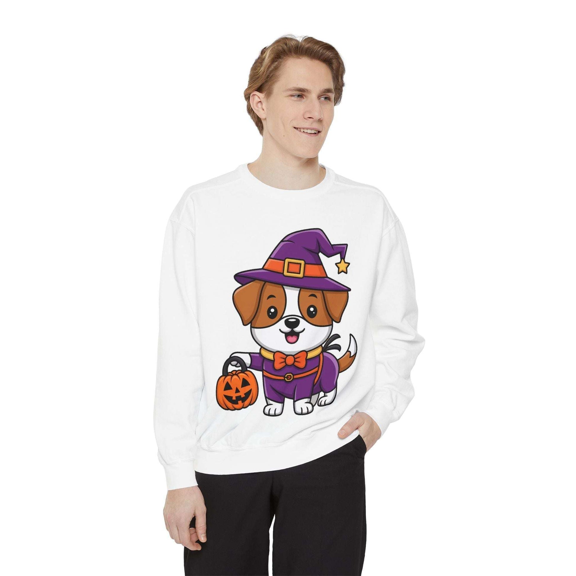 Man wearing white sweatshirt with cartoon dog dressed as witch holding pumpkin for Halloween trick or treating