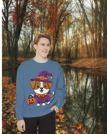 Man wearing blue sweatshirt with cute Halloween dog trick or treating design in autumn forest setting