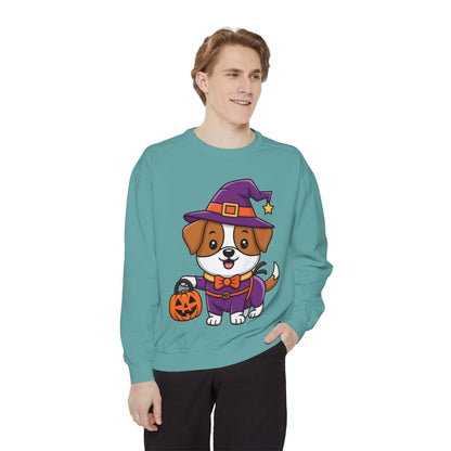 man wearing teal sweatshirt with cartoon dog dressed as a witch holding a pumpkin bucket for Halloween dog trick or treating sweatshirt