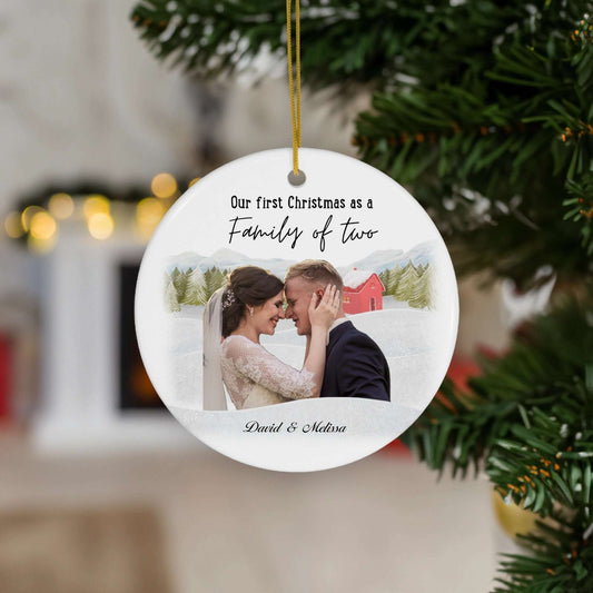 Personalized first Christmas family ornament with custom photo and names, perfect for new families celebrating their first holiday together