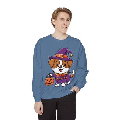 Man wearing blue sweatshirt featuring cute dog in Halloween witch costume holding pumpkin basket illustration