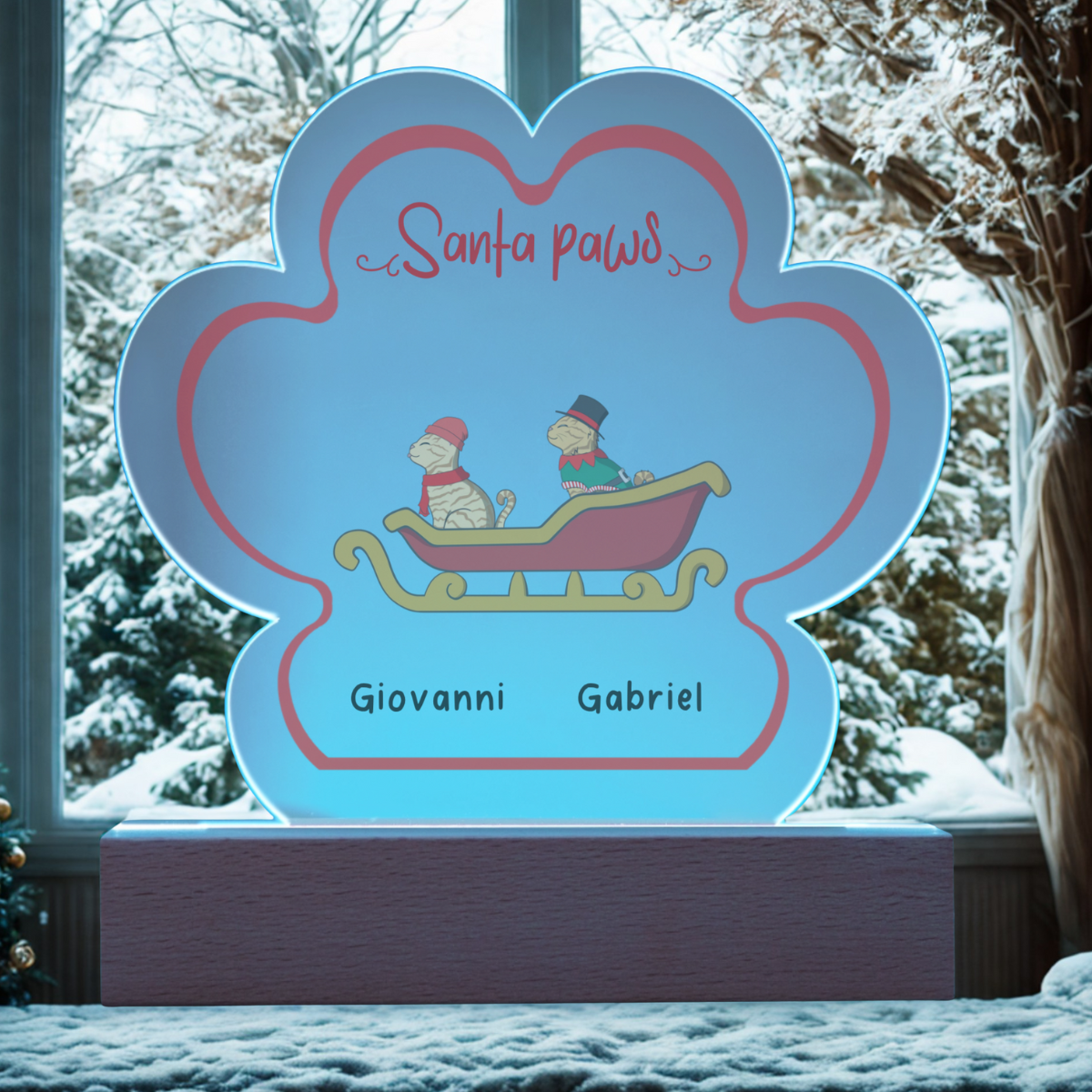 Acrylic paw print Christmas plaque with LED base showing two cats in a sleigh and personalized names Giovanni and Gabriel