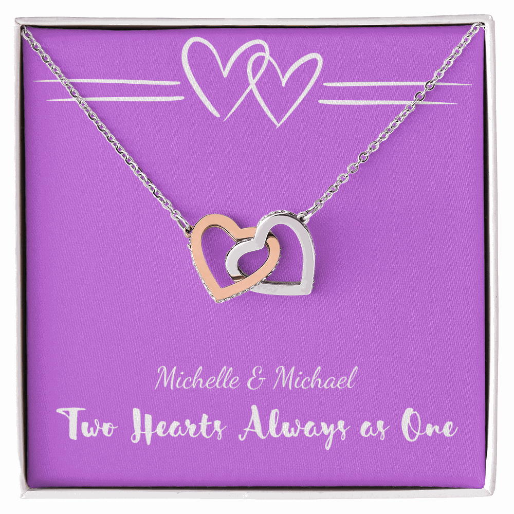 Two-tone silver and rose gold interlocking hearts necklace in purple gift box with romantic text