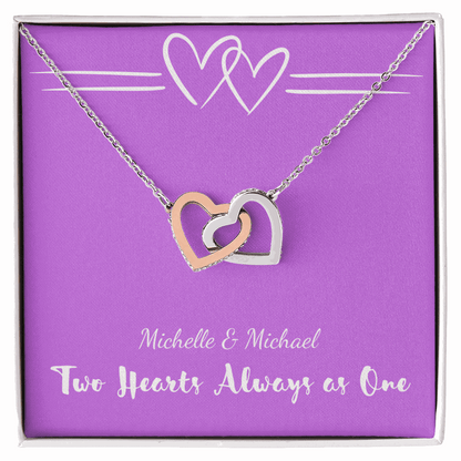 Two-tone silver and rose gold interlocking hearts necklace in purple gift box with romantic text