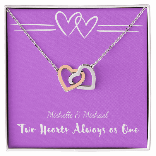 Two-tone silver and rose gold interlocking hearts necklace in purple gift box with romantic text