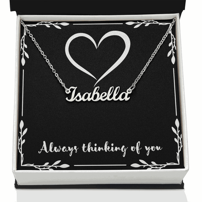 Custom name necklace with "Isabella" in cursive on an adjustable chain in a gift box with heart design and "Always thinking of you" text