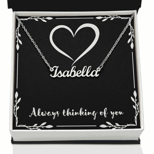 Custom name necklace with "Isabella" in cursive on an adjustable chain in a gift box with heart design and "Always thinking of you" text