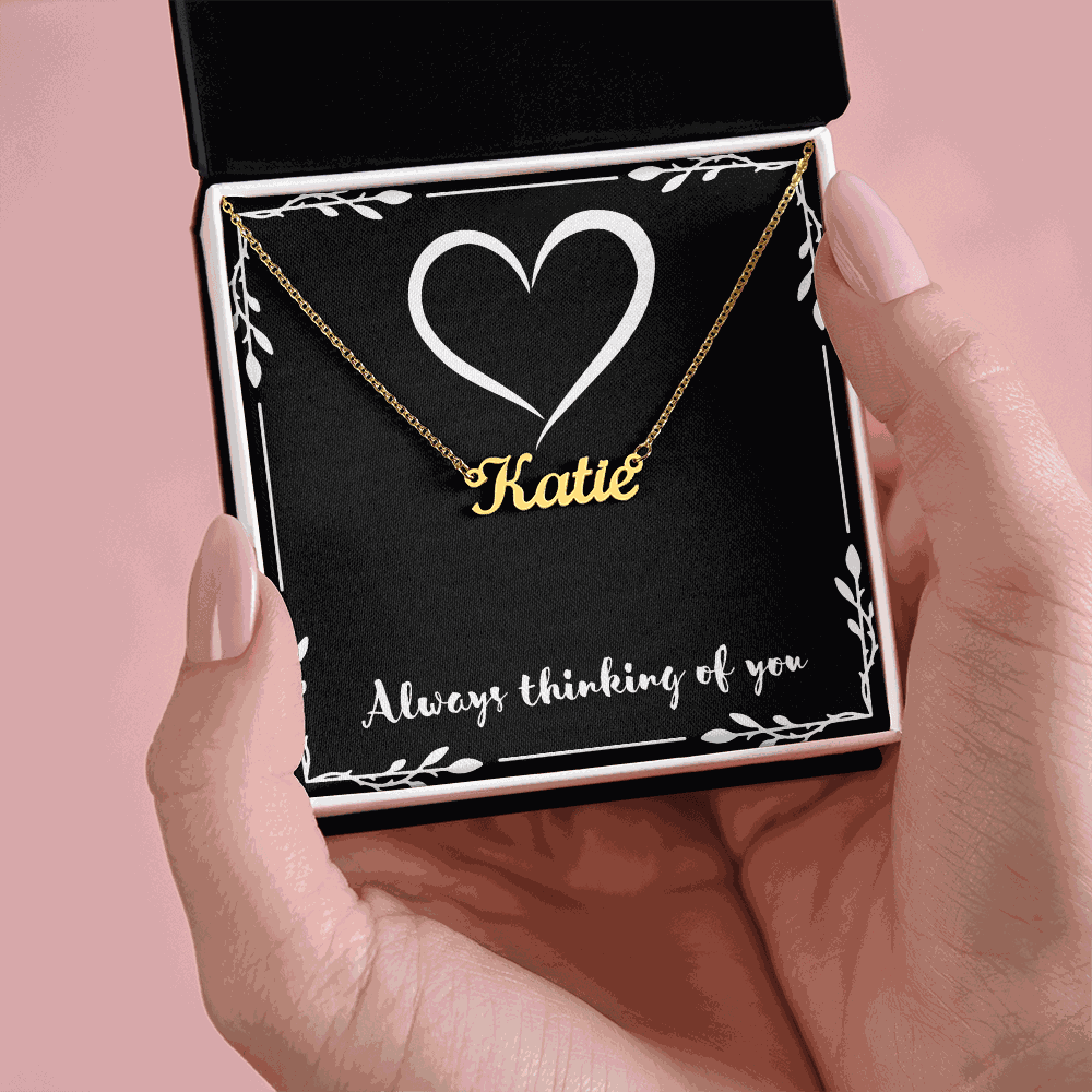 Custom gold name necklace with "Katie" on adjustable chain in gift box with heart and "Always thinking of you" message
