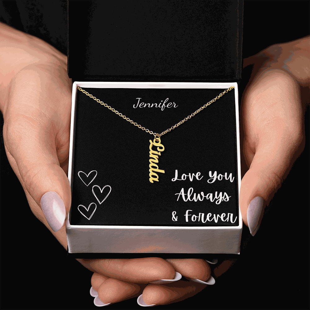 Personalized vertical name necklace in gold cursive script displayed in gift box with love message