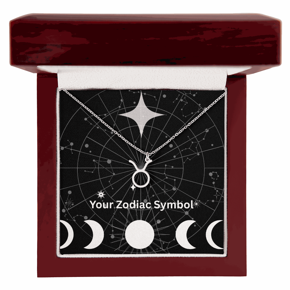 Zodiac Symbol Necklace in silver displayed in a mahogany gift box with astrological design background
