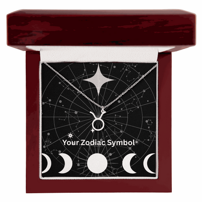 Zodiac Symbol Necklace in silver displayed in a mahogany gift box with astrological design background