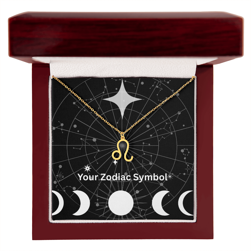 Gold zodiac symbol necklace in mahogany gift box with constellation background