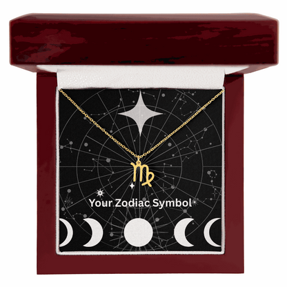 18k gold zodiac symbol necklace in luxury mahogany gift box with constellation background