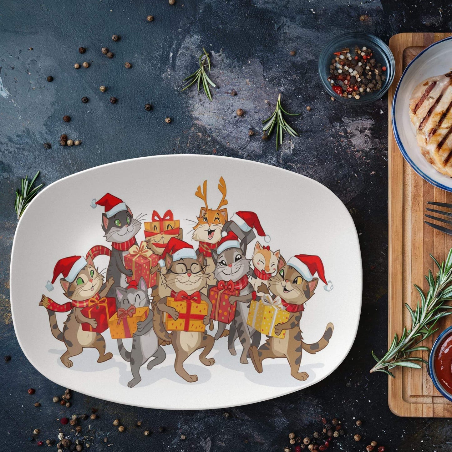 Christmas platter with festive cats wearing Santa hats and carrying gift boxes on an oval ceramic dish