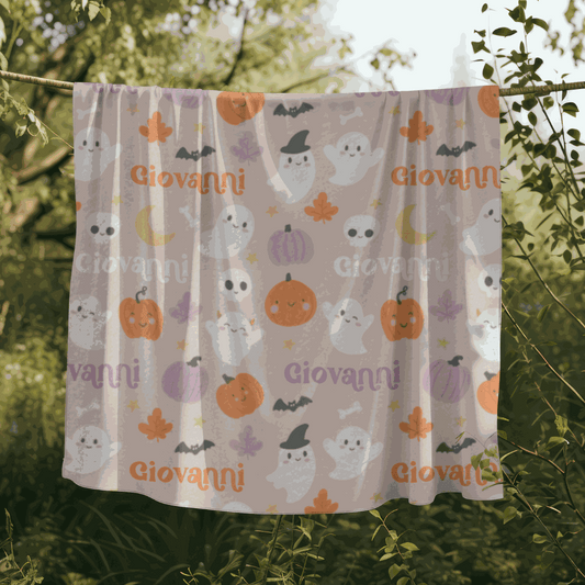 Personalized Halloween Mink Touch Fleece Blanket with ghosts, pumpkins, bats, and name Giovanni design