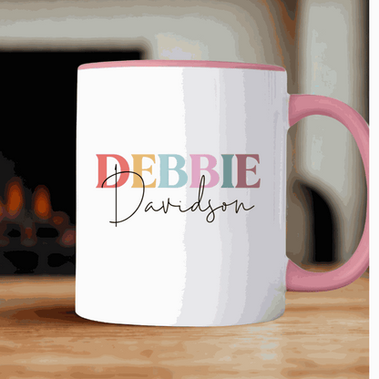 Personalized Happy Retirement Mug with colorful name print and pink handle and rim