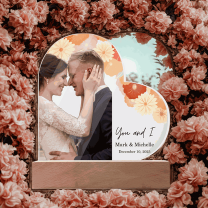 Special Love Acrylic Heart Plaque personalized wedding photo gift with floral design and names on wooden stand surrounded by pink flowers